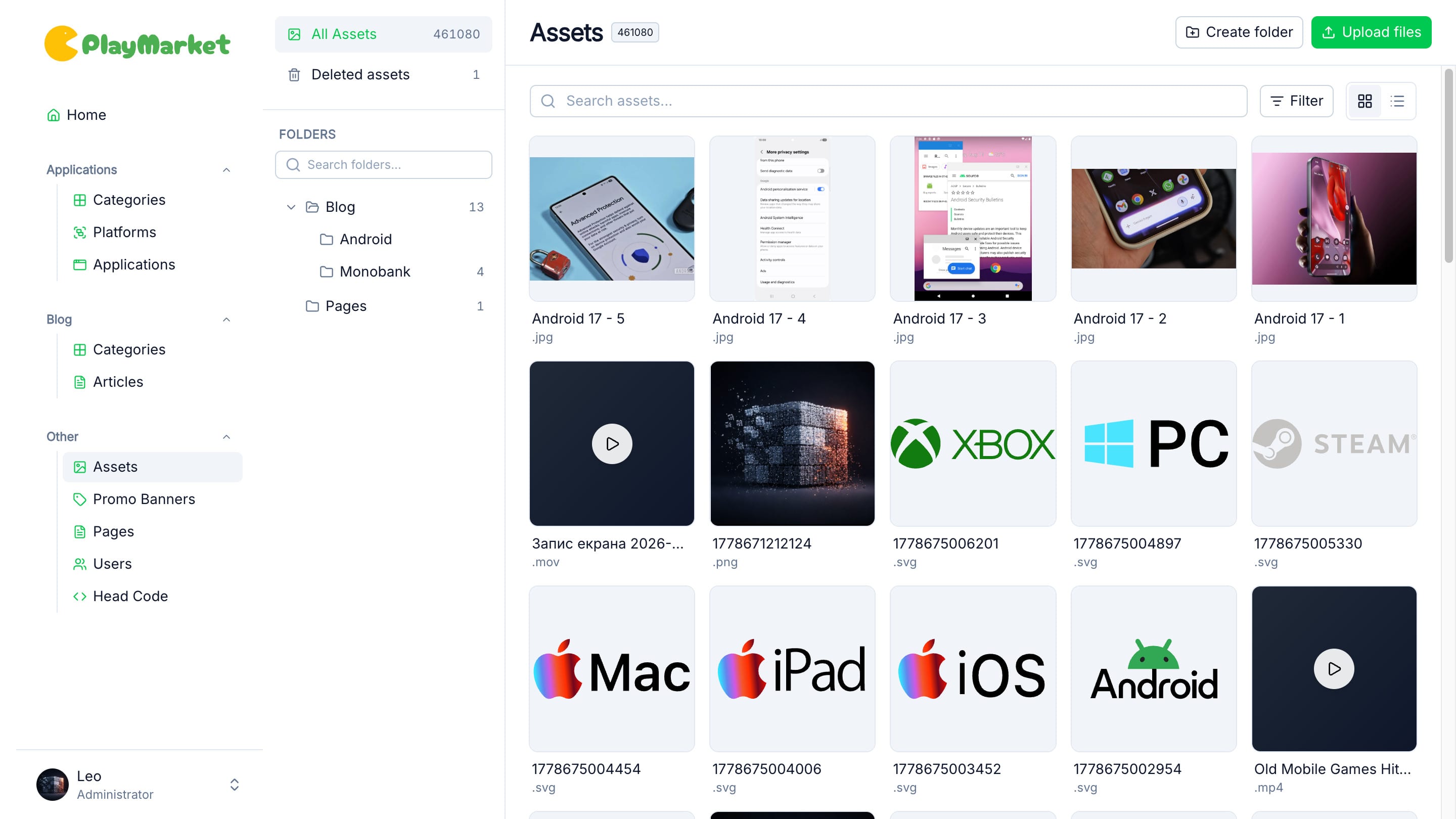 Asset manager grid with folders, images, videos and platform logos